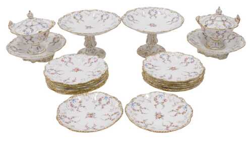 A 19thC Continental porcelain dessert service, comprising a pair of footed comports, 16cm high,...