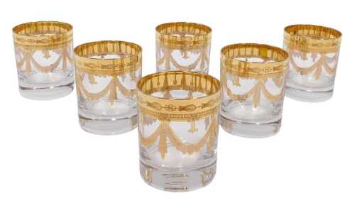 A set of six Interglass Italian Florence whisky tumblers, each gilt decorated with garlands,...
