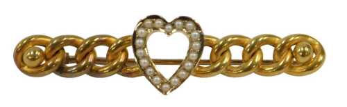 A Victorian bar brooch, with central heart shaped motif set with seed pearls, with four...