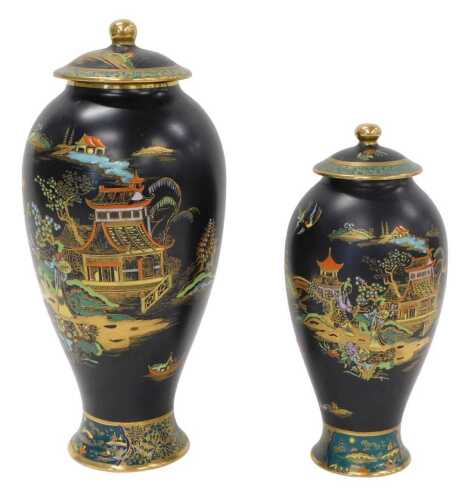 A Carltonware Bleu Royale chinoiserie pottery vase, on black ground, 32cm high, and a further...