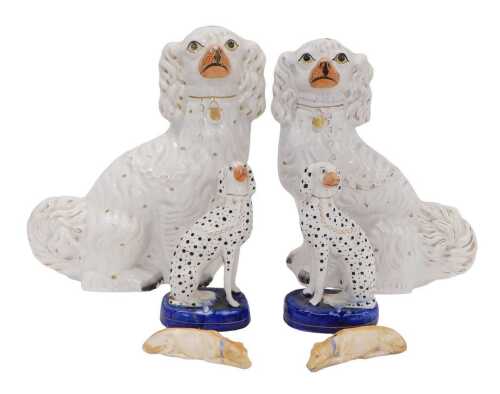 A pair of 19thC Staffordshire pottery Wally Dug spaniels, 35cm high, a pair of dalmations and a...