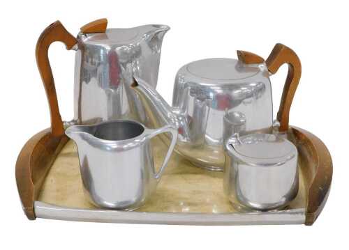 A 20thC Picquot ware part service, comprising water jug, 20cm high, teapot, milk jug, lidded...