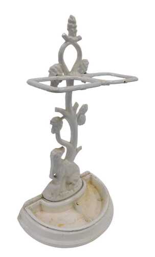 A Victorian style cast iron umbrella stand, in the manner of Coalbrookdale, with entwined tree...