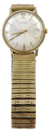 A Garrard 9ct gold cased gent's wristwatch, with a silvered baton dial with date aperture,...