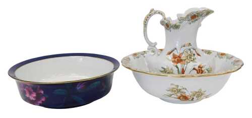 A JC Imperial rouge pottery wash bowl, 41cm diameter, and a Royal Doulton Daffodil pattern jug...