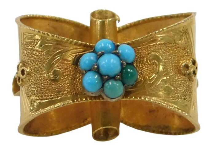 A Victorian bloomed gold brooch, centred with turquoise cluster, on brushed and scroll design,...