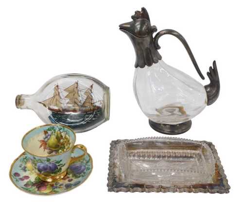 A mid-20thC Haig's whisky ship in a bottle, 20cm high, a silver plated and glass bird design...