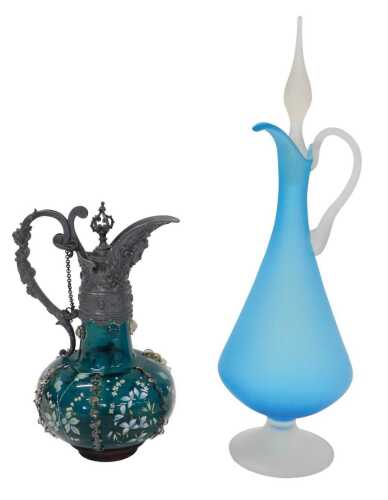 An early 20thC green glass decanter, with metal mounts, removable crown stopper, the bulbous...