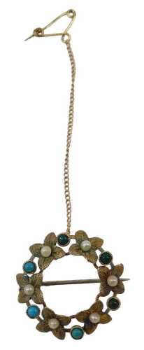 A 20thC circular brooch, formed as a flower ring, set with seed pearls and turquoise, on single...