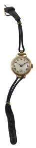 A 9ct gold cased wristwatch head, with a silvered Roman numeric dial, seconds dial and blue...