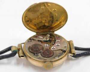 A 9ct gold cased wristwatch head, with a silvered Roman numeric dial, seconds dial and blue... - 4