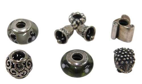 Six Pandora charms, to include hedgehog, bow, glass beads, etc., 4 boxed. (a quantity)
