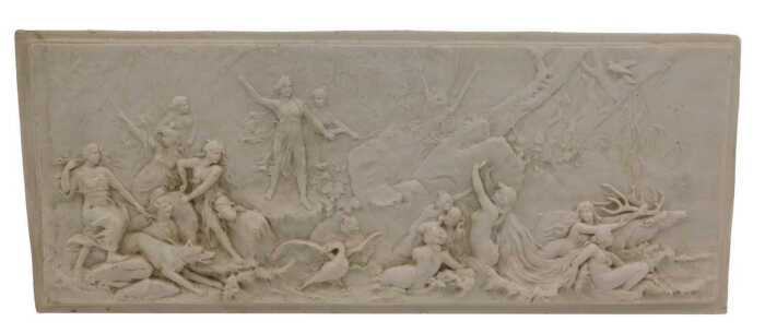 A bas-relief marble plaque, showing Diana in a naturalistic setting with other figures, 24cm x...