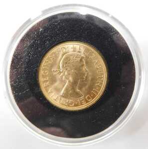 An Elizabeth II full gold sovereign, 1957, in proof style casing with Royal Mint The Sovereign... - 3