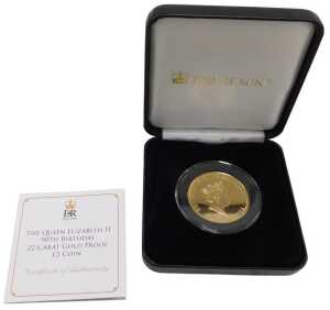 An Elizabeth II 90th birthday 22ct gold proof two pound coin, in Jubilee Mint case, with...