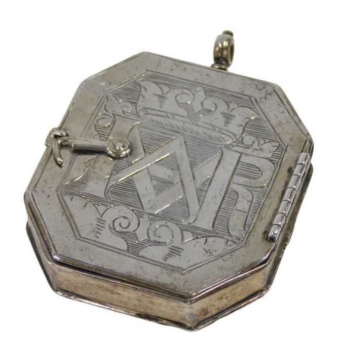 A reliquary, the front and back hinging to reveal oils on tin of Our Lady of the Most Holy...