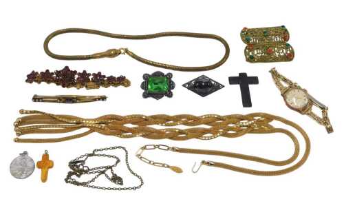 A group of assorted costume jewellery, comprising an imitation garnet set floral bracelet,...
