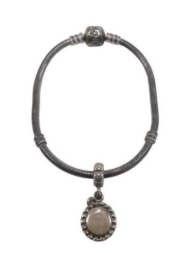 A Pandora charm bracelet, with a grandmother drop charm, stamped 925 ALE, the bracelet 18cm long,...
