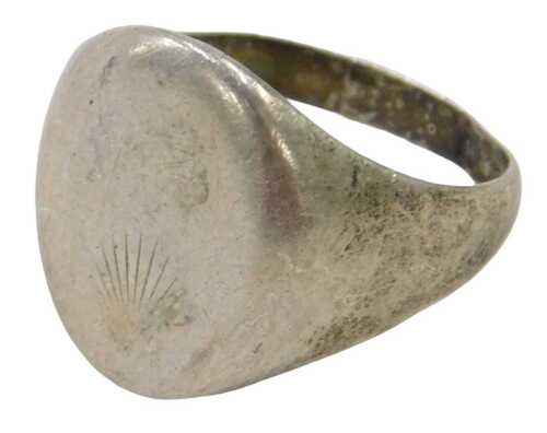 A silver gent's signet ring, the oval ring head, with splayed sun motif to base, ring size U&frac12;, 6....