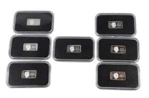 Various Queen Elizabeth II proof ingot coins, to include Bailwick of Jersey fifty pence, etc.,...
