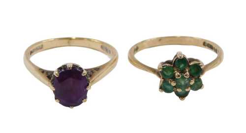 Two 9ct gold dress rings, comprising an emerald cluster, ring size O, and an oval amethyst...