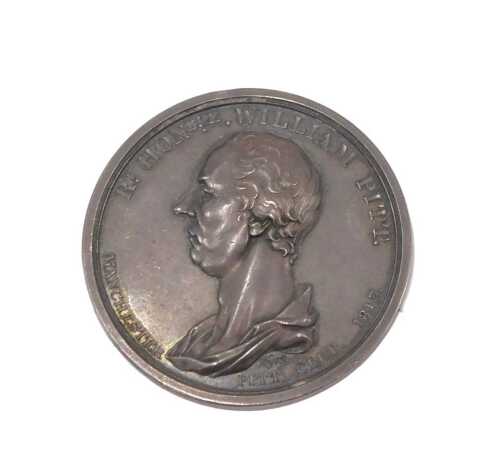 A silver coloured metal medallion, modelled with the profile of the Right Honorable William Pitt,...