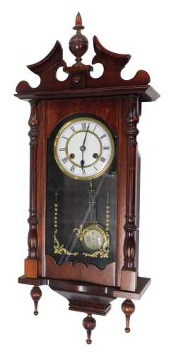 An early 20thC walnut stained case Vienna wall clock, of small proportion, the 13cm diameter...