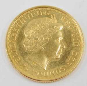 A coin, marked Elizabeth II twenty five pounds, 1/4ounce fine gold, Britannia 2000. - 2