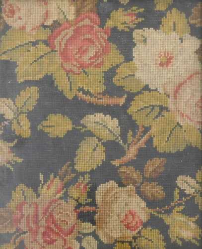 A 19thC petit point floral embroidery, 29cm x 24cm.