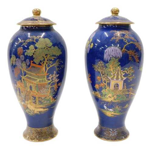 A pair of 20thC Carltonware Bleu Royale chinoiserie vases, each with gilt highlights, 30cm high....