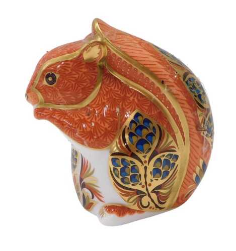 A Royal Crown Derby paperweight ornament squirrel, silver stopper, 10cm high.