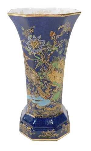 A Carltonware Bleu Royale chinoiserie vase, of octagonal form, decorated with exotic birds and...