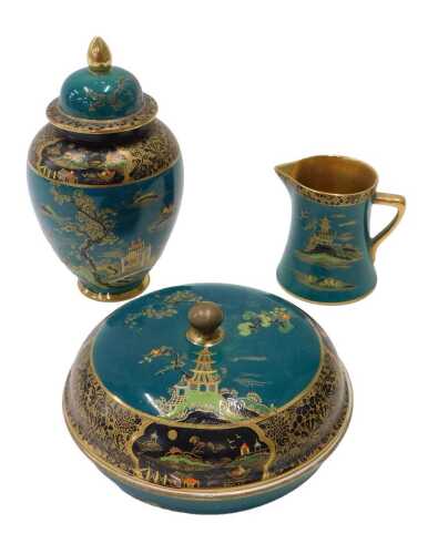 A Carltonware Mikado Pagoda chinoiserie powder box and cover, 15cm diameter, on green ground,...