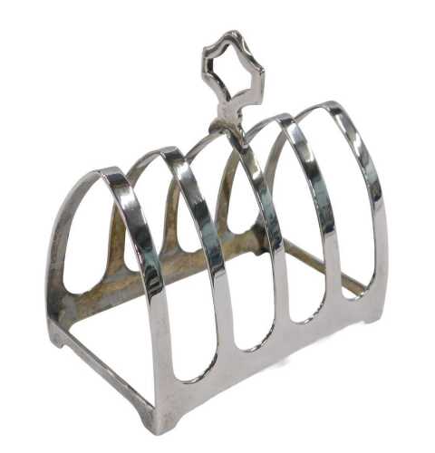 A George VI silver four sectional toast rack, with mitre shaped sections and shaped central...