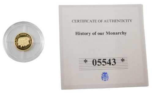 A Year of The Three Kings 14ct gold commemorative proof coin, showing George V, Edward VIII and...
