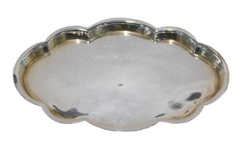 An Edward VII silver coaster or tray, of shaped oval form, by J&J Maxfield Limited, Sheffield...