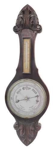 An early 20thC Continental barometer and thermometer, with 20cm diameter dial and heavily carved...
