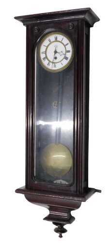 An early 20thC Vienna wall clock, the 12cm diameter Roman numeric dial, in a walnut stained case,...