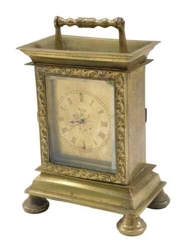 A late 19thC brass carriage or travel clock case, on compressed bun feet, with earlier verge...