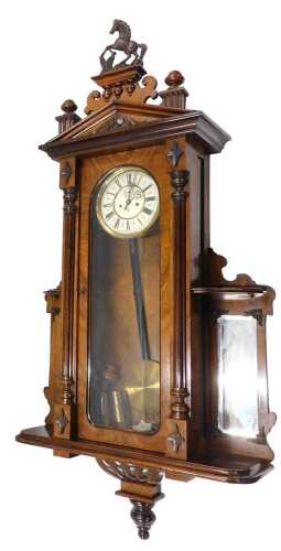 A 19thC walnut cased twin weight Vienna wall clock by Gustav Becker, the 9cm diameter Roman...