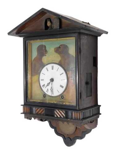 An unusual 19thC blinker Black Forest cuckoo clock, the 11cm diameter enamel dial set with Roman...