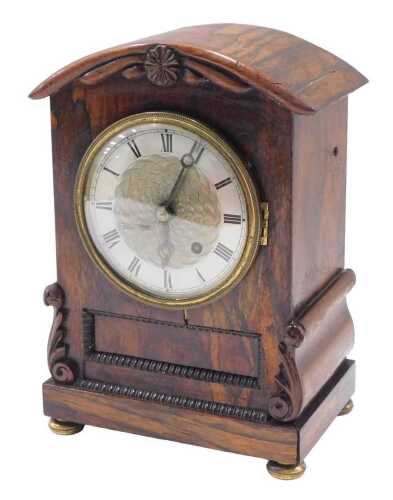 A 19thC rosewood mantel clock, the fancy 11cm diameter dial with Roman numerals and single...
