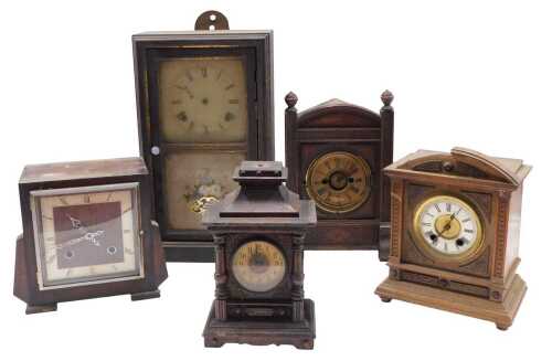 A late 19thC HAC walnut cased mantel clock, with 9cm diameter Roman numeric dial, in a heavily...