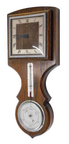 A 20thC eight day wall clock barometer and thermometer, in carved oak case, marked Made in...