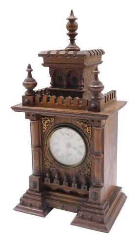 A 19thC oak cased mantel clock, the 7cm diameter Roman numeric dial with subsidiary dials, in a...