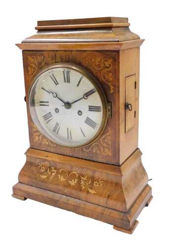 A 19thC walnut cased caddy top mantel clock, the 14cm diameter Roman numeric dial in an inlaid...