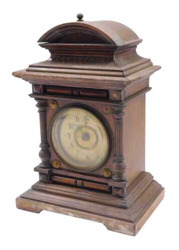 A 19thC Junghans mantel clock, of small proportion, the 7cm diameter Arabic dial in an...