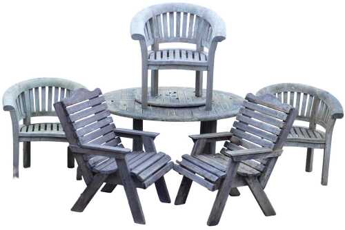 A teak garden set, comprising table of circular form, with inset lazy susan, 150cm diameter,...