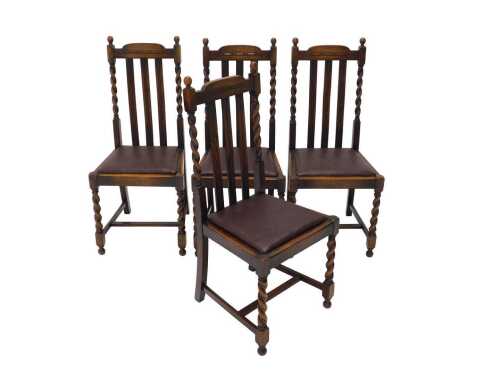 A set of four early 20thC oak barley twist dining chairs, each with moulded backs raised above...