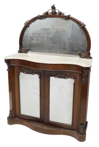 A Victorian rosewood mirror back chiffonier, of small proportion, the heavily carved mirror back...